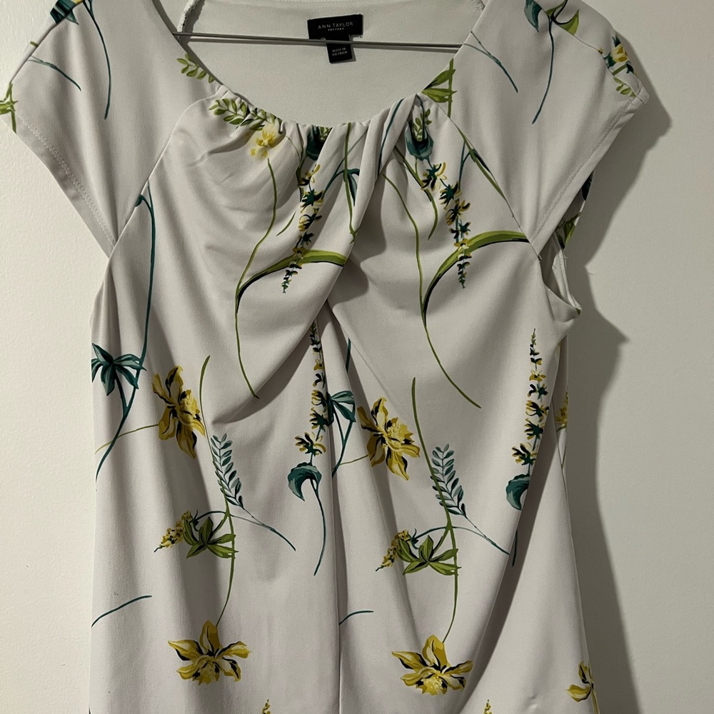 Ann Taylor cap sleeve shirt.  Size medium, cream color.